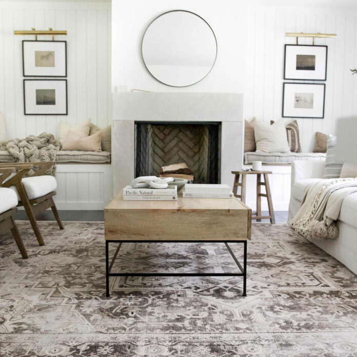 white living room with large rug