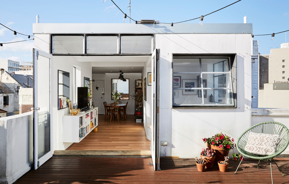 An Art Deco-Meets-Warehouse Apartment With A Private Rooftop!
