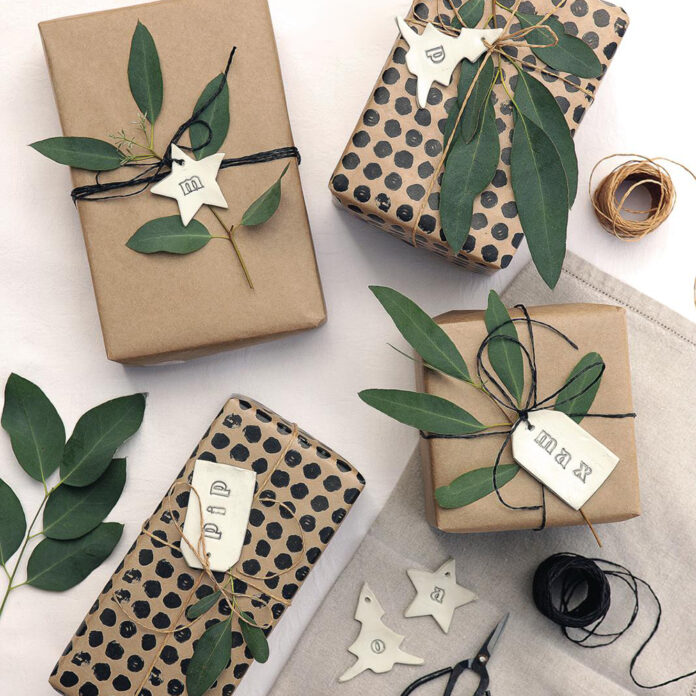 Airdry clay gift tags on Kraft paper presents with foliage