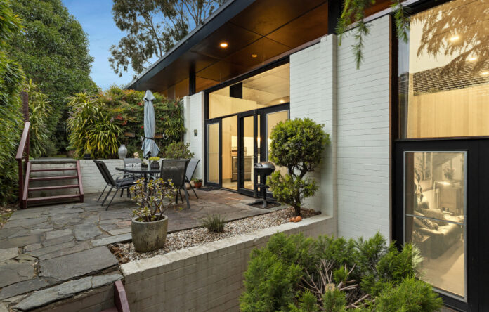 A Pristine Mid-Century Family Home Buried In Greenery