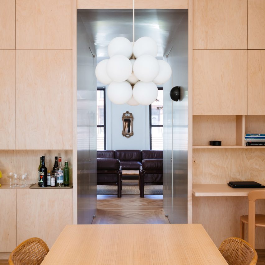 View through millwork block from kitchen to living room