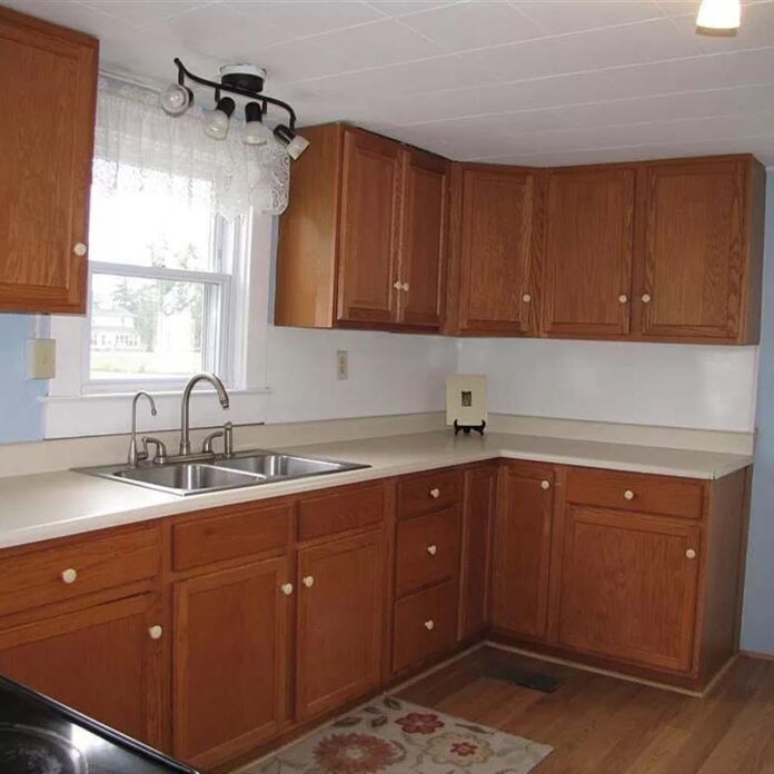 plain kitchen with brown cabinetry