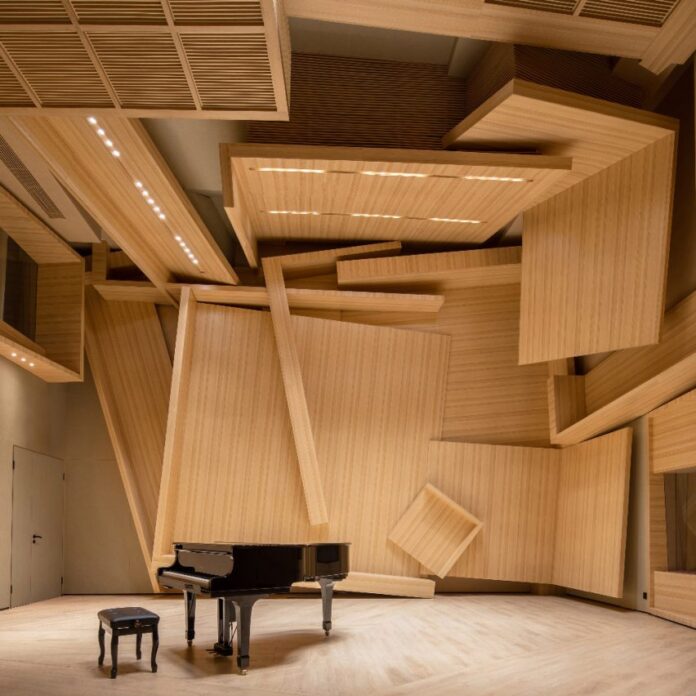 A grand black piano inside Meilan Music Studio