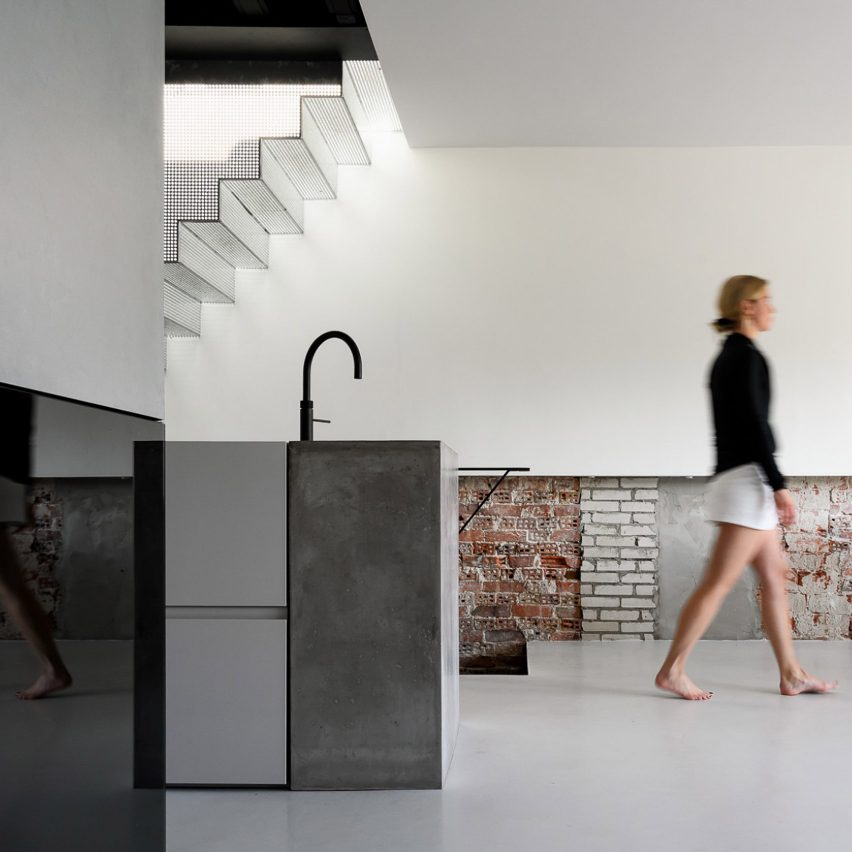 Living area inside Reflections of the Past loft in Amsterdam by Firm Architects