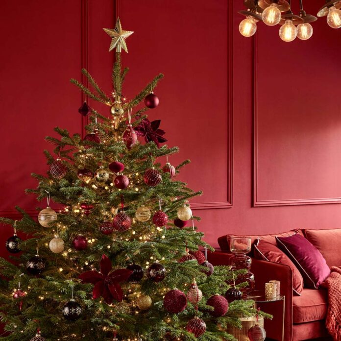 christmas tree in red living room