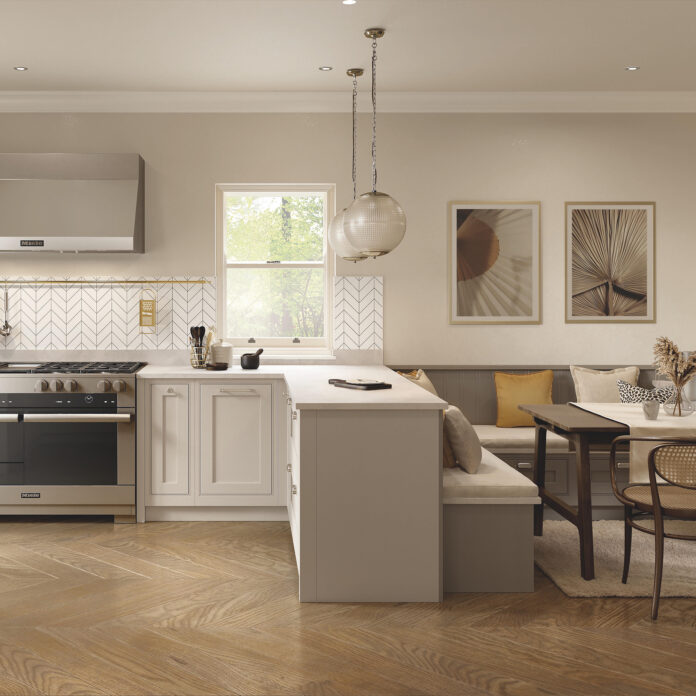 ream shaker kitchen with white worktops and a warm wood floor