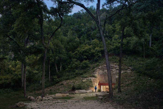 Beautiful little wine cave neatly carved into the side of a limestone hill in Texas Hill Country