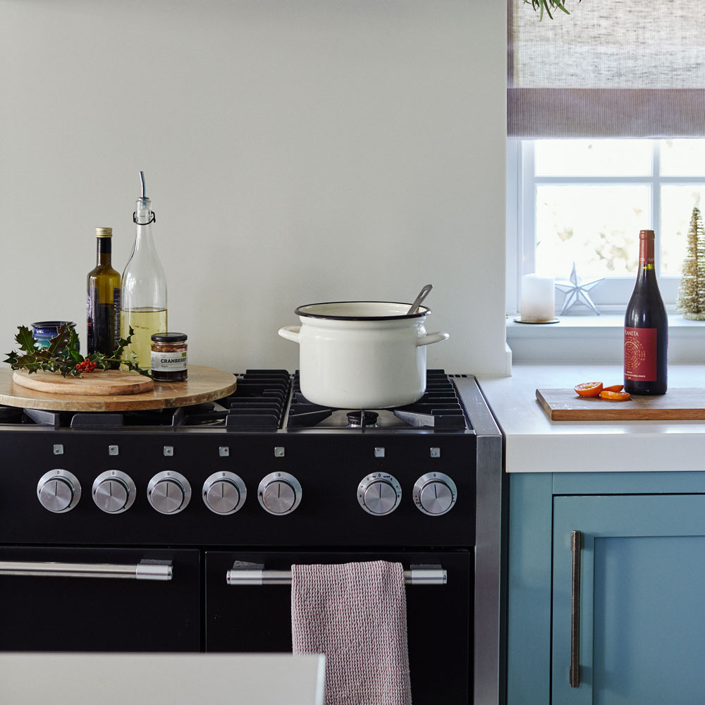 gas cooker in blue kitchen