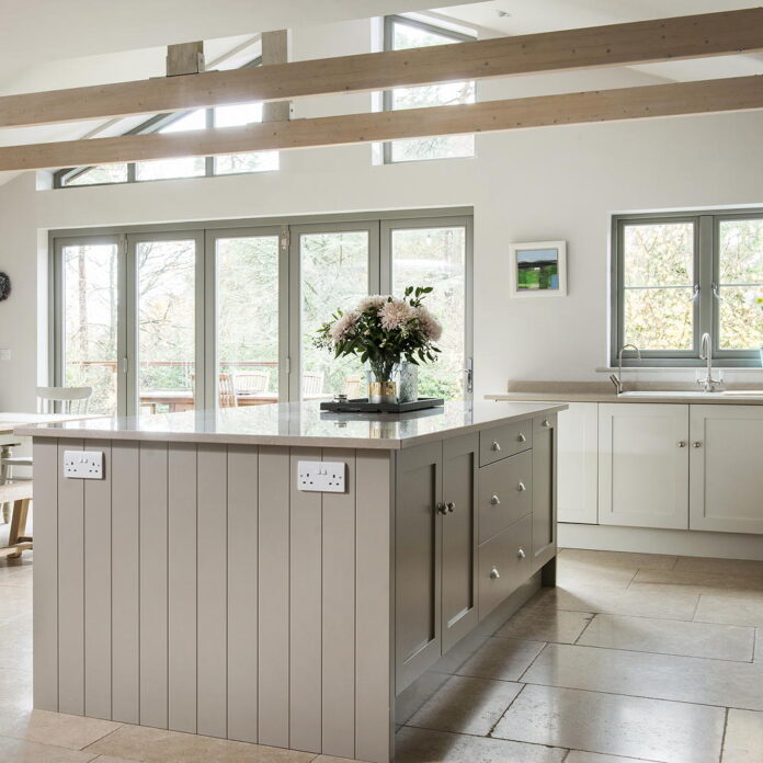 neutral painted kitchen cabinets with island unit