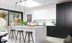 Kitchen island with three adjustable pendant lights