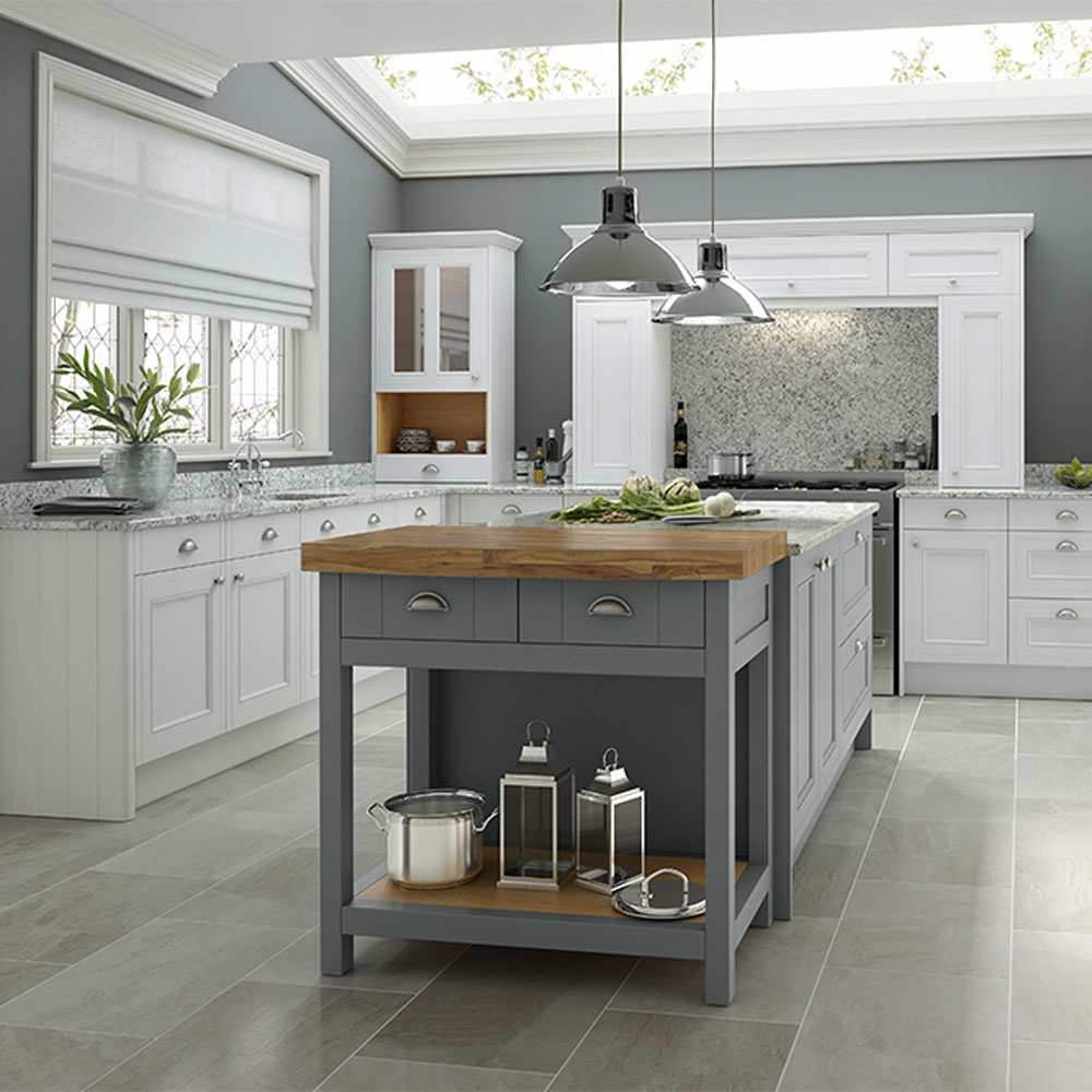 White kitchen with grey walls, skylight and grey kitchen island 