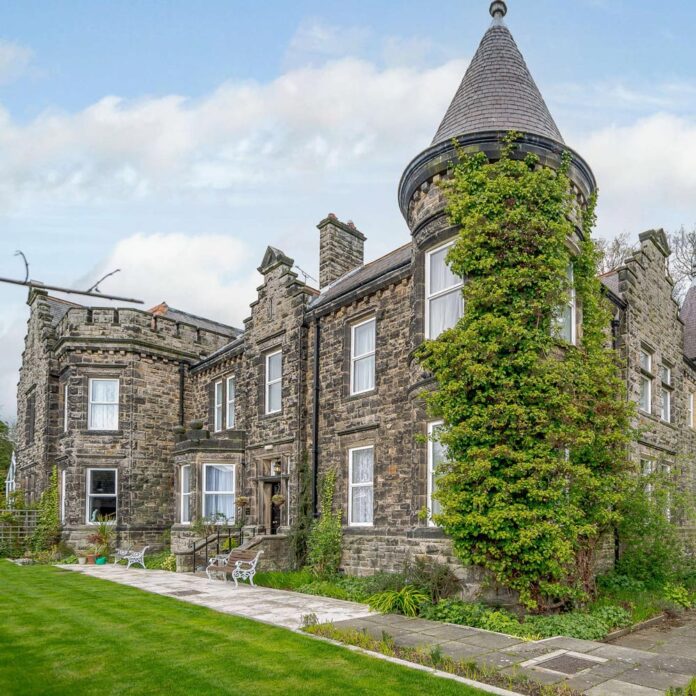 stone house exterior with turret