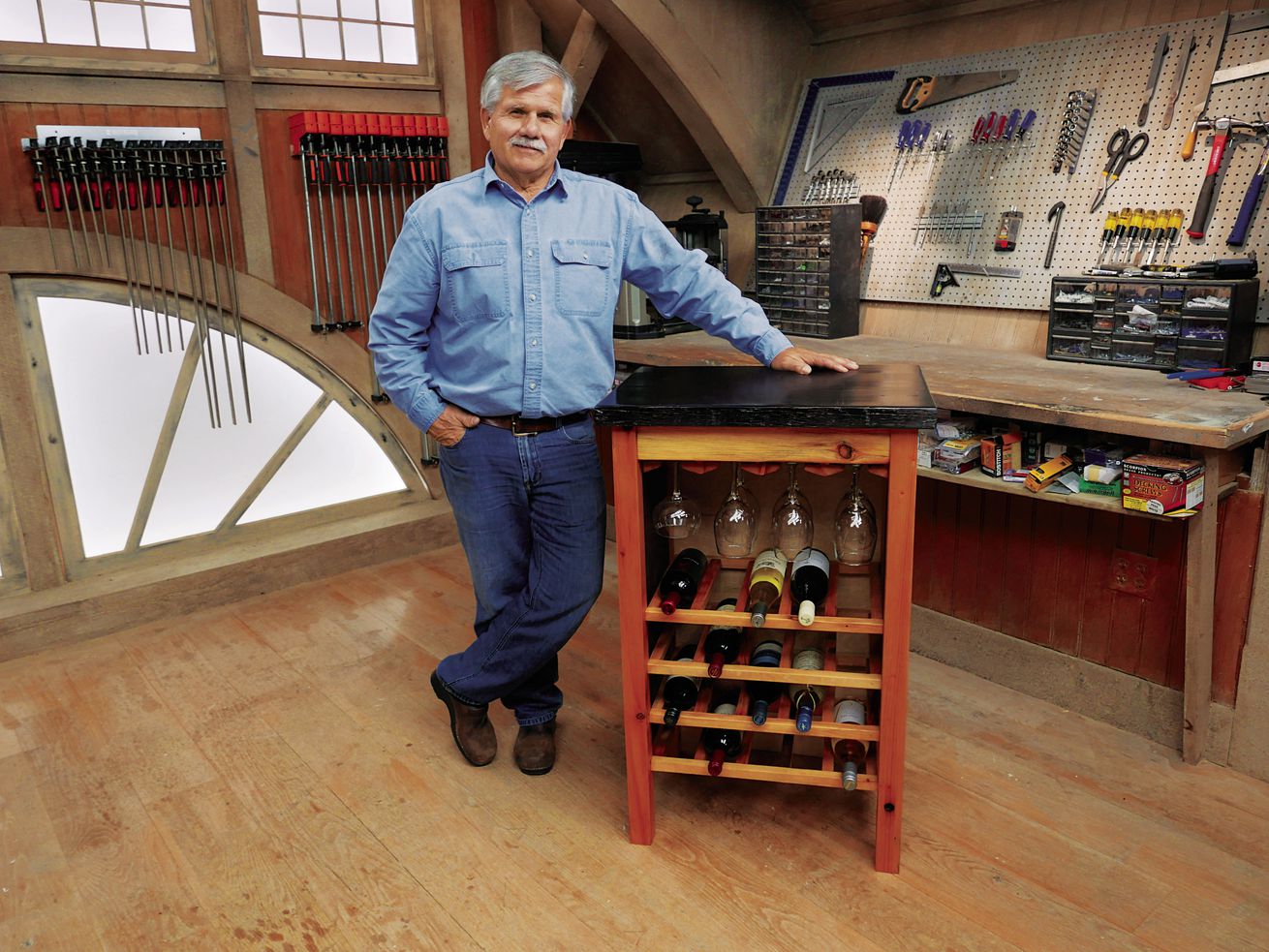 Tom Silva builds a reclaimed wine rack.