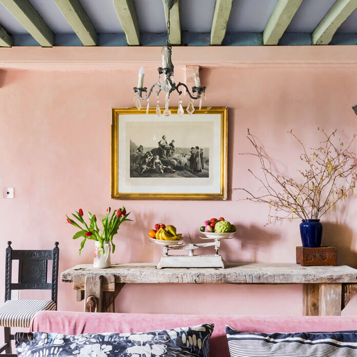 Pink living room with blue ceiling