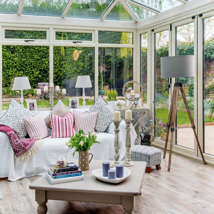 Interior of conservatory with sofa and coffee table