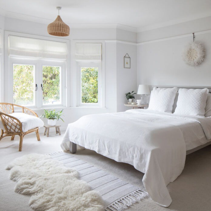 white bedroom with tactile accessories