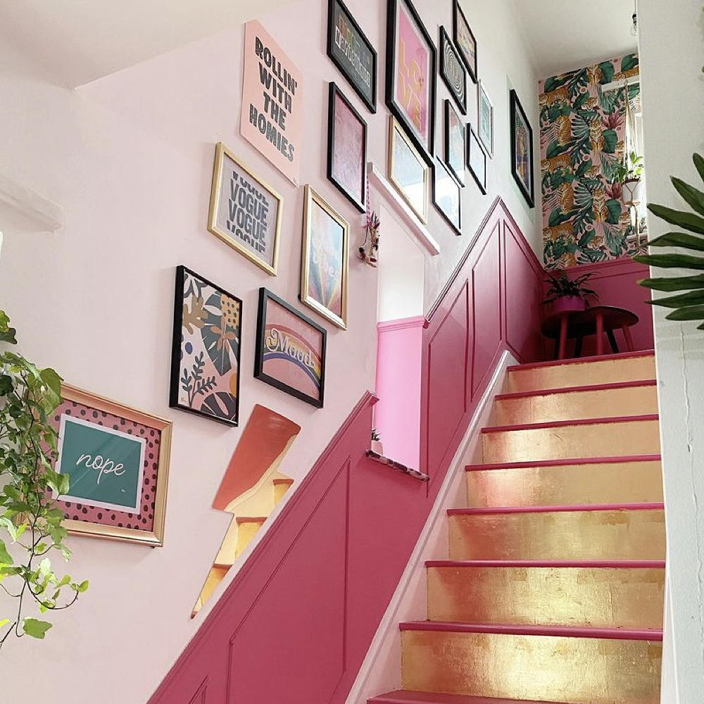 pink stair case with gold leaf