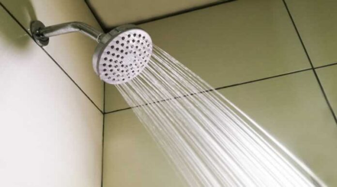 How to remove flow restrictor from shower head