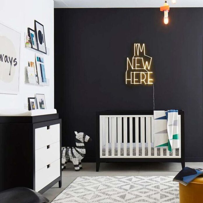 Contemporary nursery with black walls