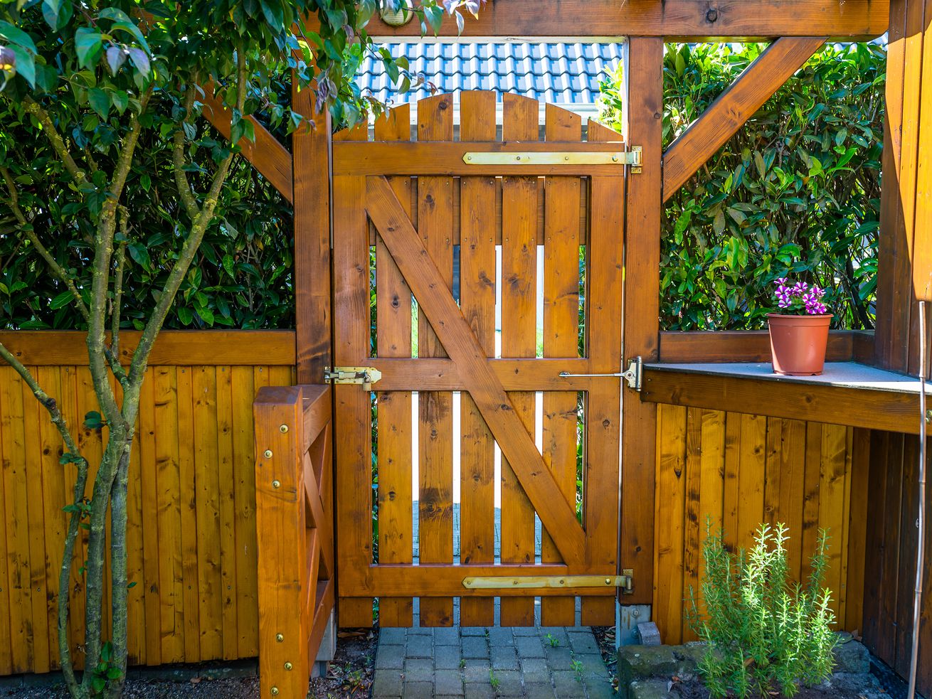 Stained fence in garden.