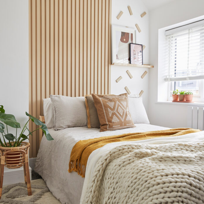 white bedroom with wood panelling