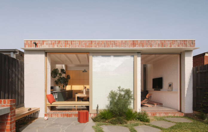 A Cheerful Brick Addition To A Weatherboard Home