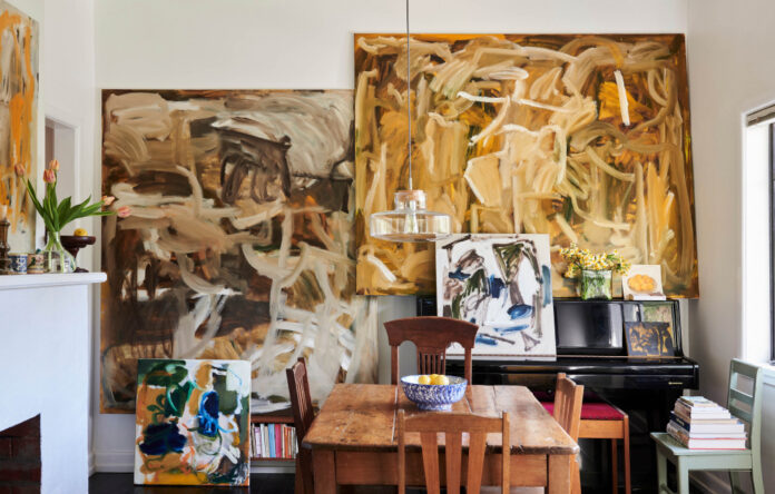 An Artist’s Home Bursting With Her Own Beautiful Golden-Toned Paintings