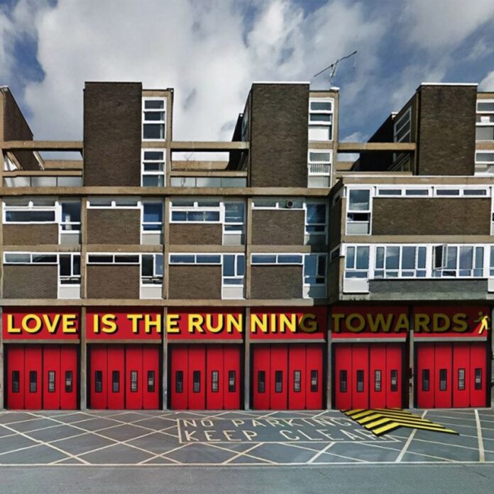 Exterior of Shoreditch Fire Station with bright red shutters