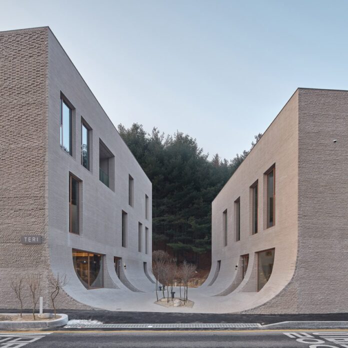 The two Cafe Teri buildings by Nameless Architecture with central courtyard