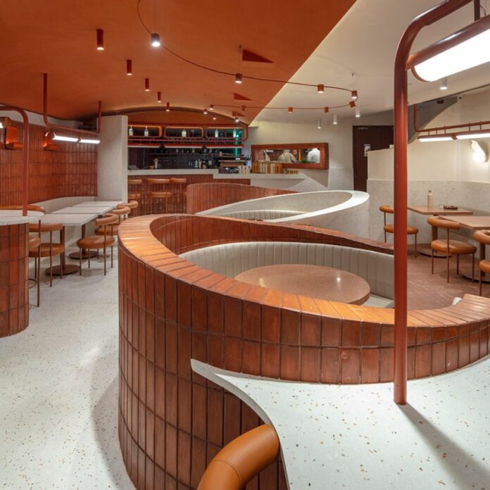 Curved booths inside Rosie and Tillie cafe