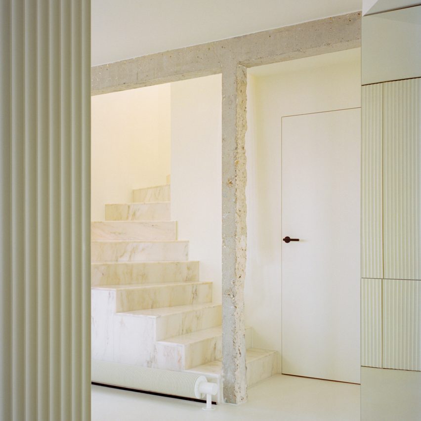 Interior image of the marble staircase at The Edge