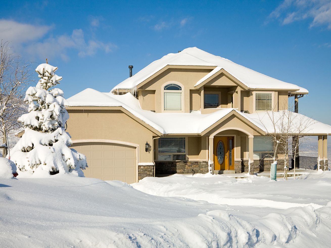 Exterior of home in snow