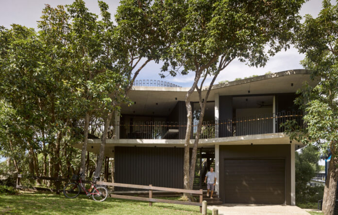 A Floating House Entangled In Brush Box Trees On North Stradbroke Island