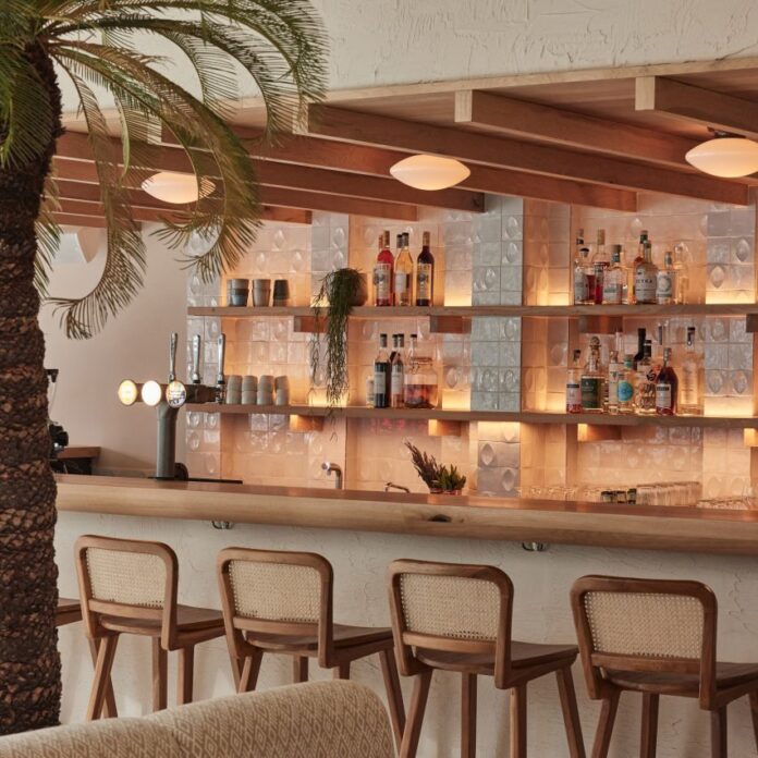 Bar area of Milk Beach Soho restaurant by A-nrd