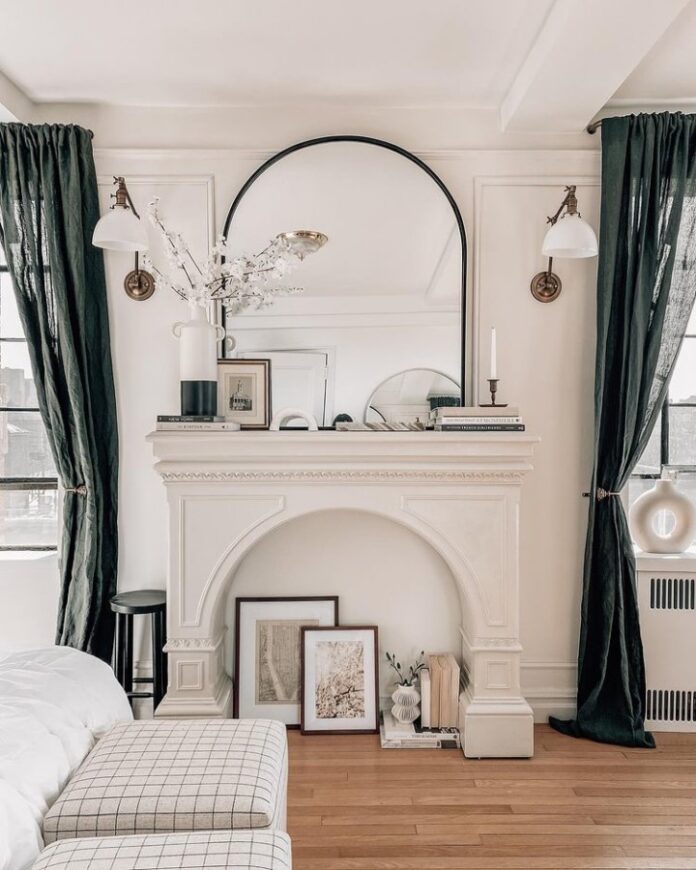 bedroom with  faux fireplace