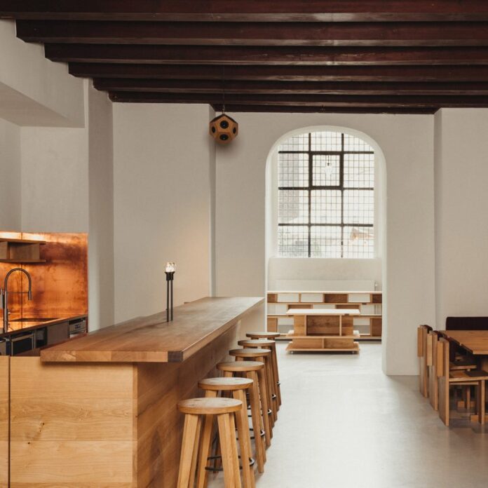 Wood and copper furniture inside Nikolaj Kunsthal