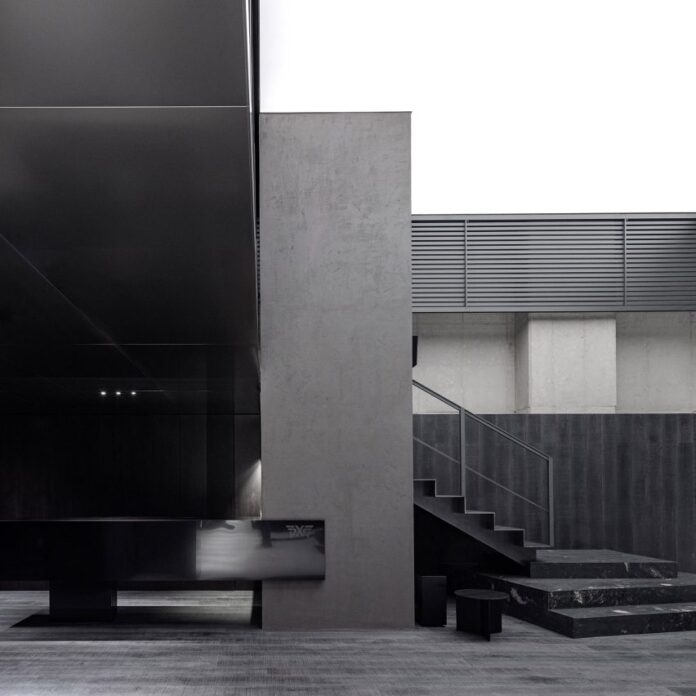 Grey and black PXG flagship store in Seoul by WGNB