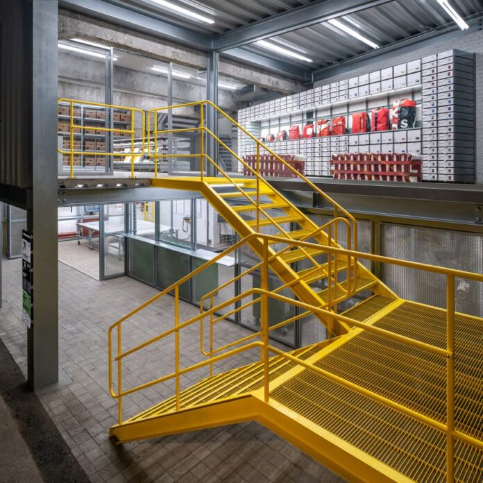Shanghai Freitag store in 1970s textile factory by Kooo Architects