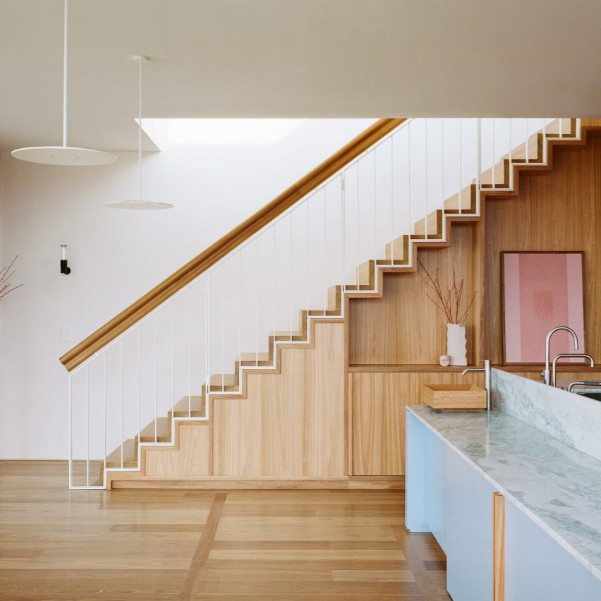 Wooden staircase inside Elsternwick Penthouse in Melbourne by Office Alex Nicholls