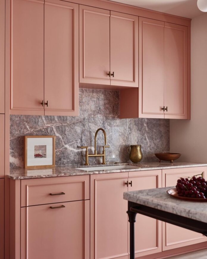 pink muted kitchen with marble counter