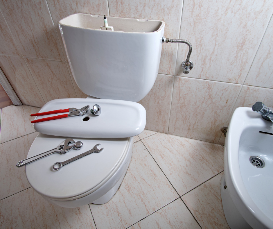 A toilet tank with a dripping sound coming from it