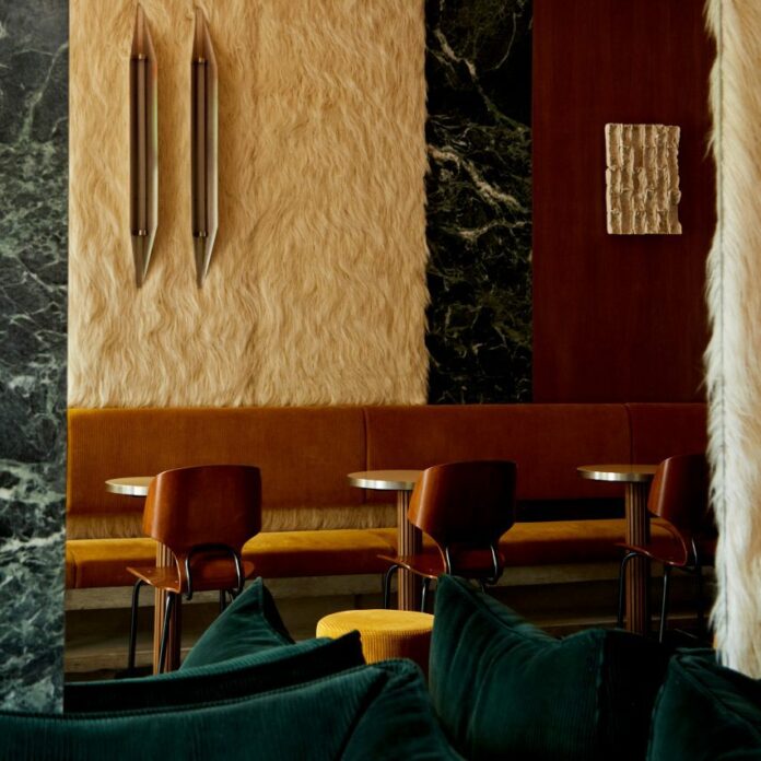 Giampiero Tagliaferri lines Aspen coffee bar with green marble and faux fur