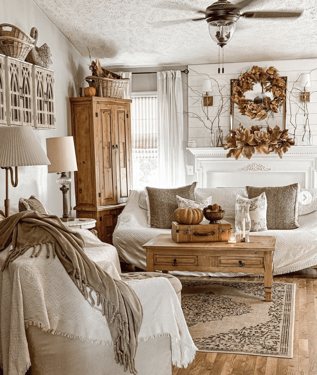 Fall neutral living room with decor wood coffee table and white furniture.