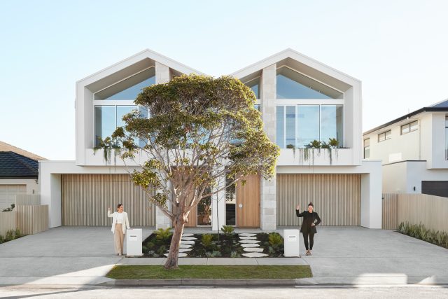 Twins knock down and rebuild new homes nextdoor to each other