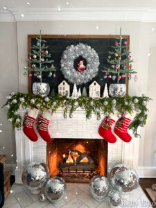Mantel decorated for Christmas in a disco ball theme
