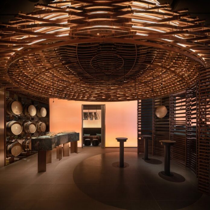 Interior of Lai Zhou Bar by RooMoo features offcuts from wooden whiskey barrels