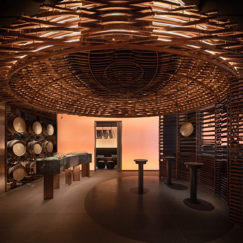 Interior of Lai Zhou Bar by RooMoo features offcuts from wooden whiskey barrels