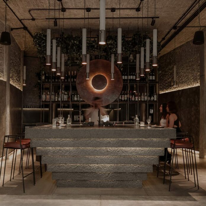 Mexico City restaurant by RA! arranged around upside-down pyramid bar
