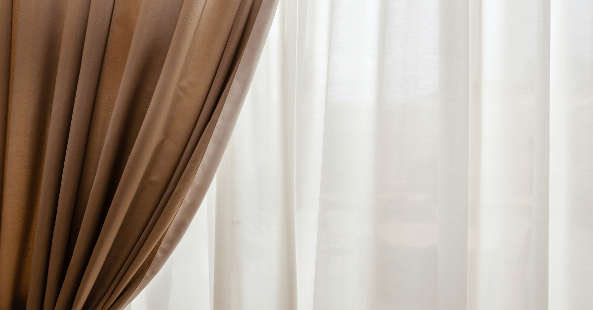 Living room with luxurious velvet drapes.