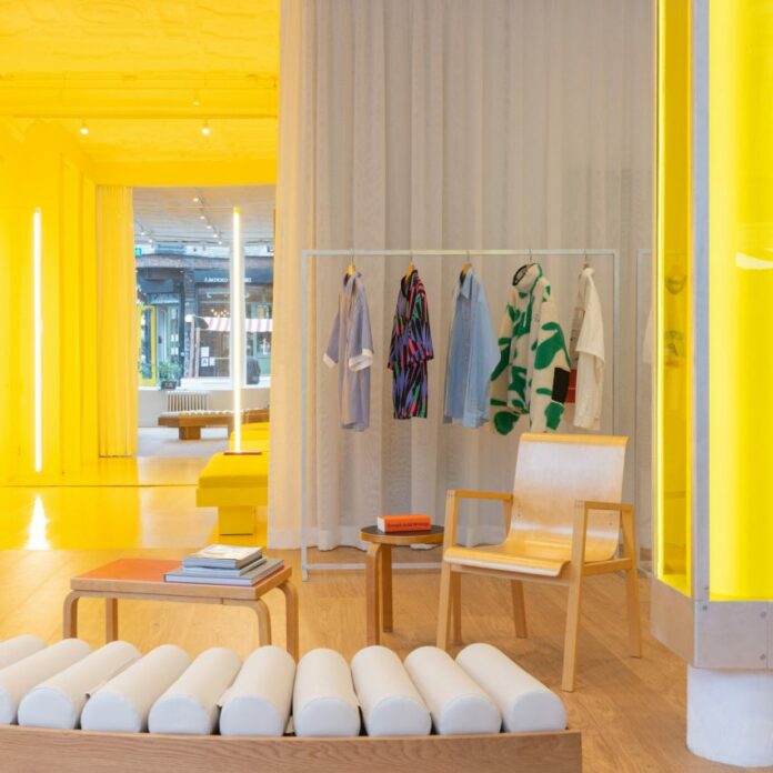 Yellow lighting illuminates Le Père store in New York by BoND